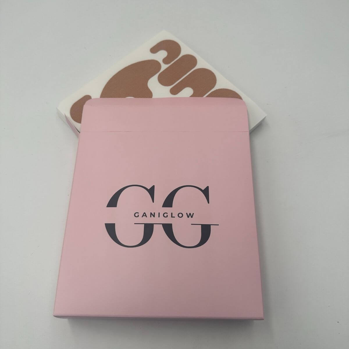 GaniGlow Face Lifting Tape in a pink box – non-surgical facelift for youthful skin